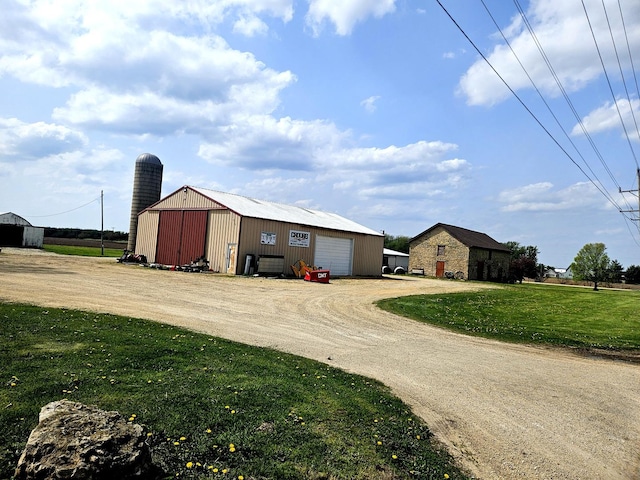 8554 S Daysville Rd, Franklin Grove, IL 61031 - view of outdoor structure featuring an outdoor structure and driveway