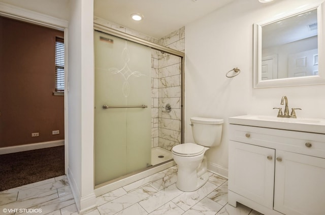 full bath featuring a stall shower, vanity, baseboards, toilet, and marble finish floor