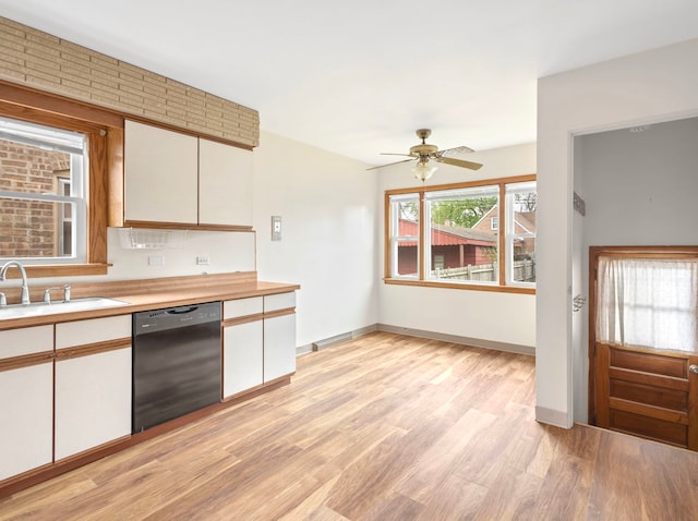 14216 S Normal Ave, Riverdale, IL 60827 - kitchen with a ceiling fan, light wood-type flooring, light countertops, a sink, and dishwasher