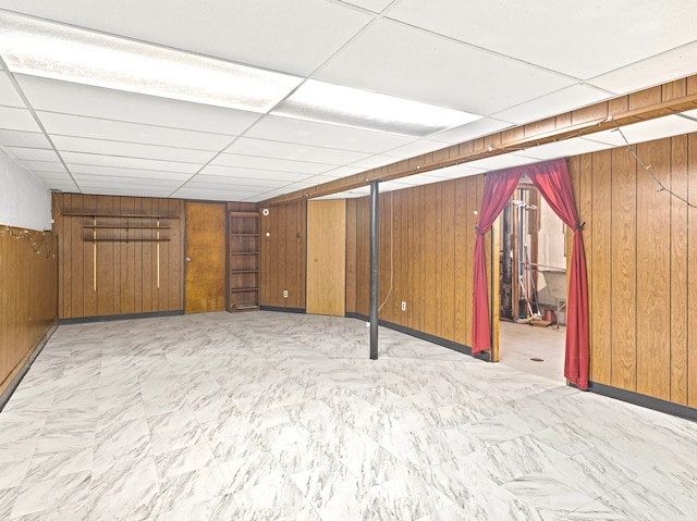 14216 S Normal Ave, Riverdale, IL 60827 - finished below grade area featuring wooden walls, baseboards, and a drop ceiling