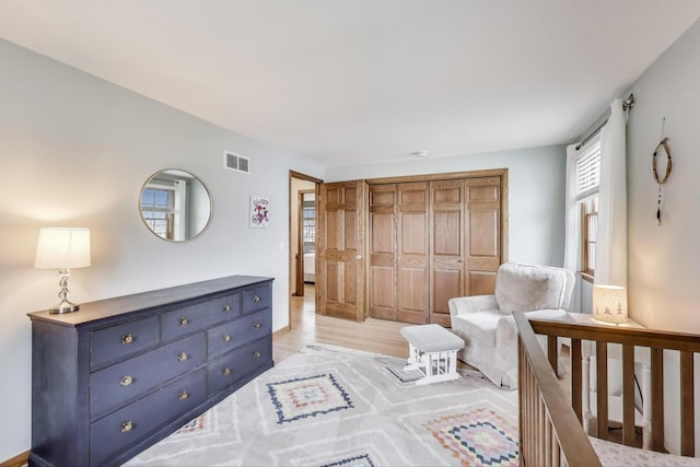 1608 N Douglas Ave, Arlington Heights, IL 60004 - bedroom featuring a closet and light wood finished floors