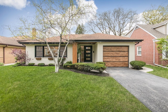 1528 S Ashland Ave, Park Ridge, IL 60068 - view of front of house featuring roof with shingles, an attached garage, a front lawn, brick siding, and driveway