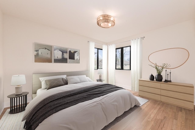 1528 S Ashland Ave, Park Ridge, IL 60068 - bedroom with light wood-style floors and baseboards