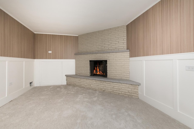 1528 S Ashland Ave, Park Ridge, IL 60068 - unfurnished living room featuring a fireplace, carpet flooring, and a decorative wall