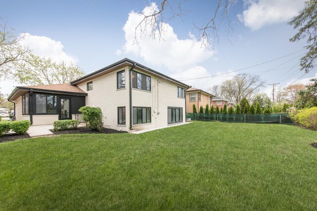 1528 S Ashland Ave, Park Ridge, IL 60068 - back of house with fence and a yard