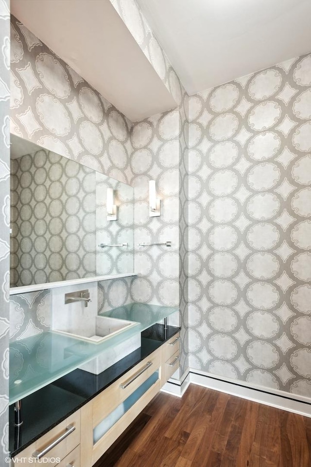 bathroom featuring vanity and wood finished floors