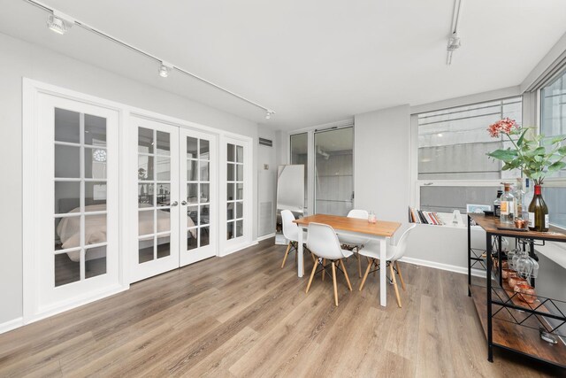 345 N La Salle Dr Unit 1205, Chicago, IL 60610 - sunroom featuring track lighting and french doors