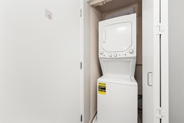 345 N La Salle Dr Unit 1205, Chicago, IL 60610 - washroom featuring stacked washer / drying machine and laundry area