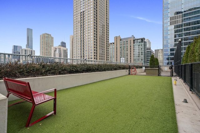 345 N La Salle Dr Unit 1205, Chicago, IL 60610 - exterior space with fence and a view of city