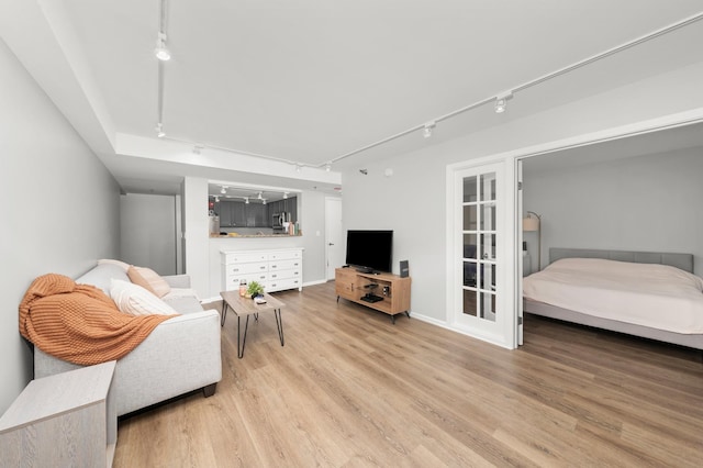 345 N La Salle Dr Unit 1205, Chicago, IL 60610 - living room with light wood-style floors, french doors, and rail lighting