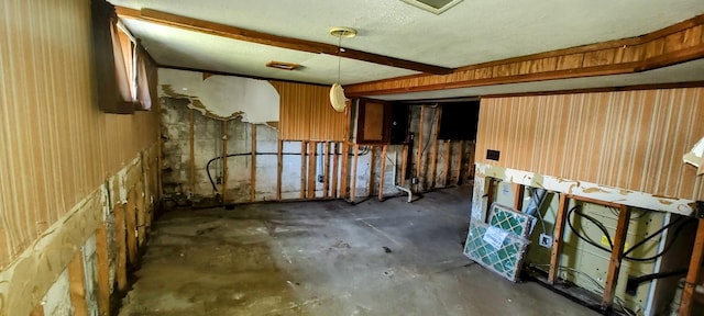 interior space with unfinished concrete flooring
