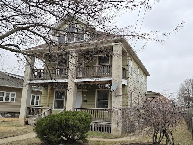 exterior space featuring a porch and a balcony