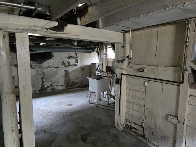 unfinished basement with a sink