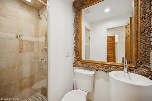1050 Cedar Ln, Lake Forest, IL 60045 - bathroom with a stall shower, toilet, a sink, and recessed lighting