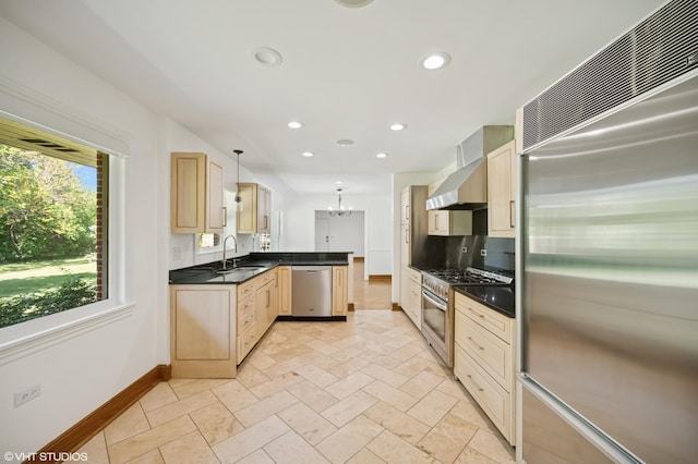 1050 Cedar Ln, Lake Forest, IL 60045 - kitchen featuring stainless steel appliances, baseboards, wall chimney range hood, a peninsula, and recessed lighting