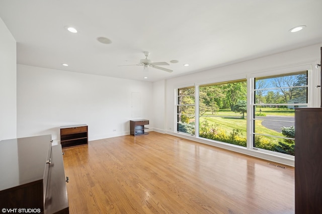 1050 Cedar Ln, Lake Forest, IL 60045 - empty room featuring ceiling fan, wood finished floors, and recessed lighting