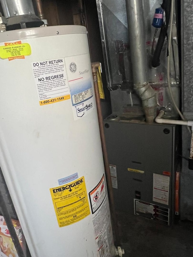 14534 S Grant St, Dolton, IL 60419 - utility room featuring water heater and heating unit