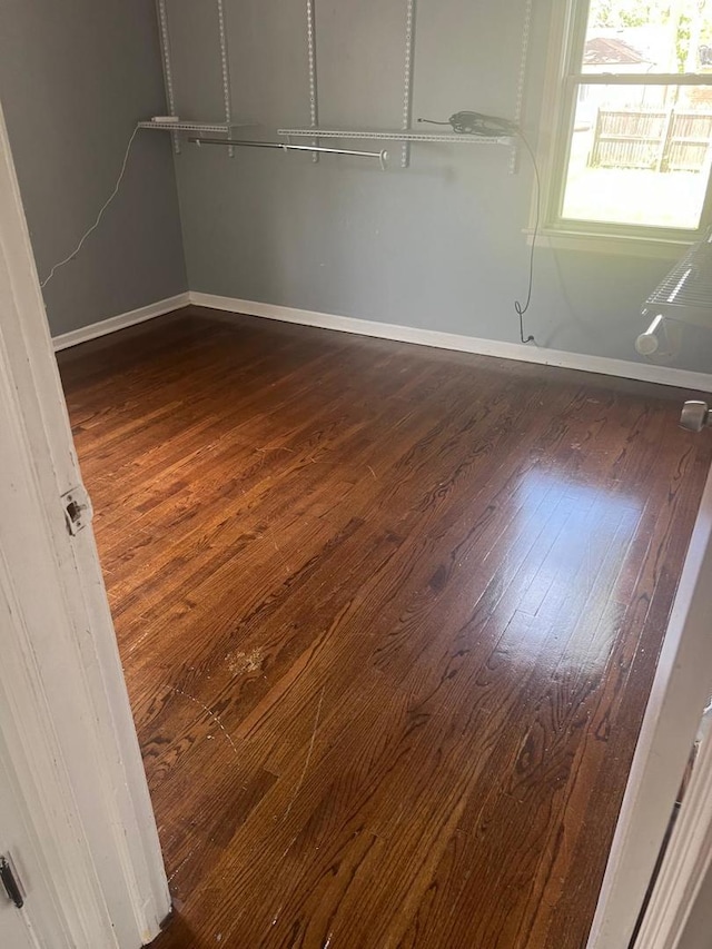 14534 S Grant St, Dolton, IL 60419 - empty room featuring dark wood-style floors and baseboards