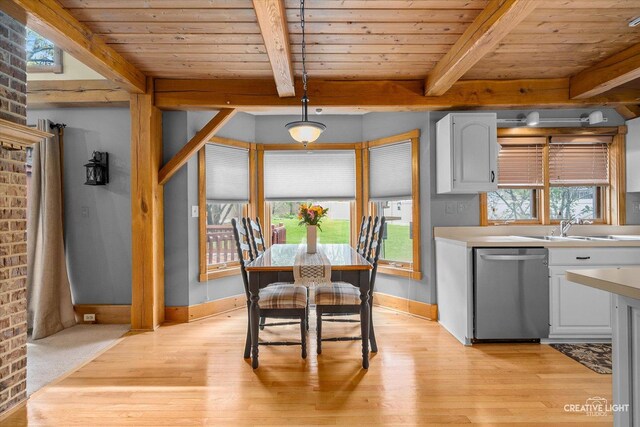 405 Cambridge Way, Bolingbrook, IL 60440 - dining space featuring light wood-style floors, wood ceiling, plenty of natural light, beamed ceiling, and baseboards