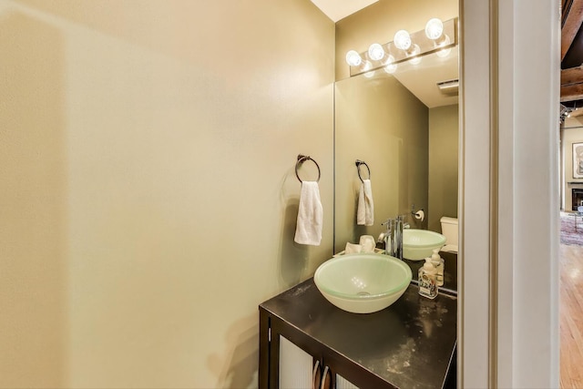 half bath featuring vanity