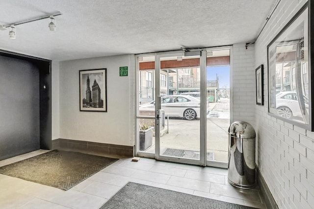 community lobby featuring a textured ceiling