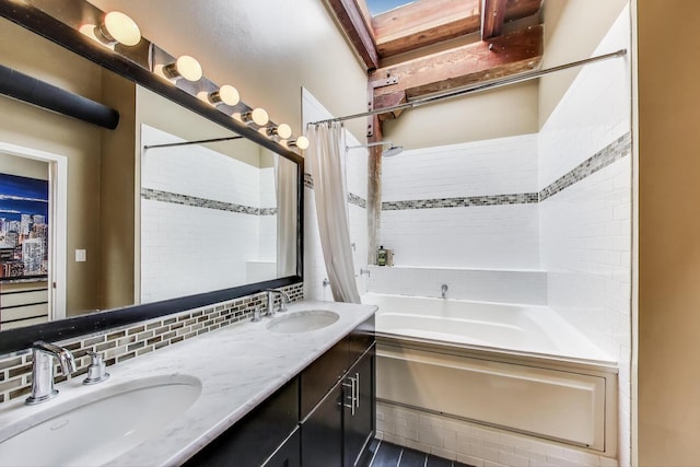 bathroom with shower / bath combination with curtain and double vanity