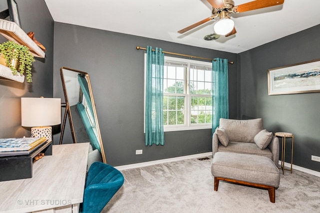 1057 Ponca Dr, Batavia, IL 60510 - sitting room featuring baseboards, a ceiling fan, and carpet flooring