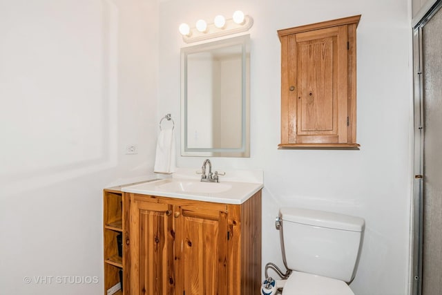 1057 Ponca Dr, Batavia, IL 60510 - bathroom featuring vanity, toilet, and an enclosed shower
