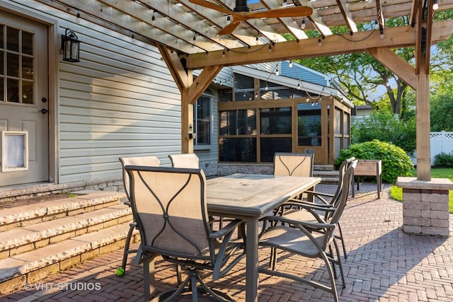 1057 Ponca Dr, Batavia, IL 60510 - view of patio / terrace with a pergola, outdoor dining area, a ceiling fan, and a sunroom