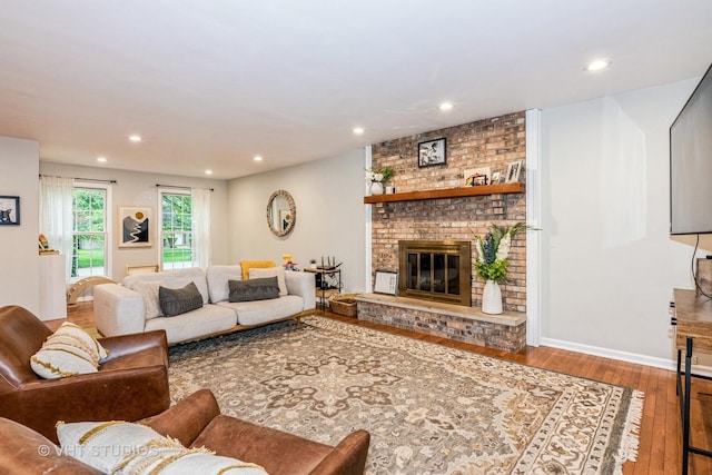 1057 Ponca Dr, Batavia, IL 60510 - living room featuring wood-type flooring, a fireplace, and recessed lighting