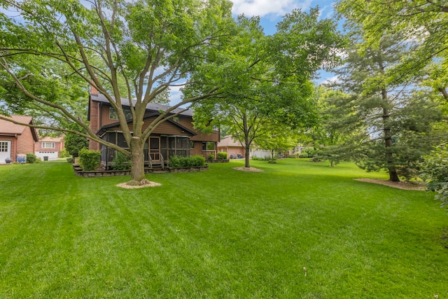 22W281 Mccarron Rd, Glen Ellyn, IL 60137 - view of grassy yard featuring a sunroom