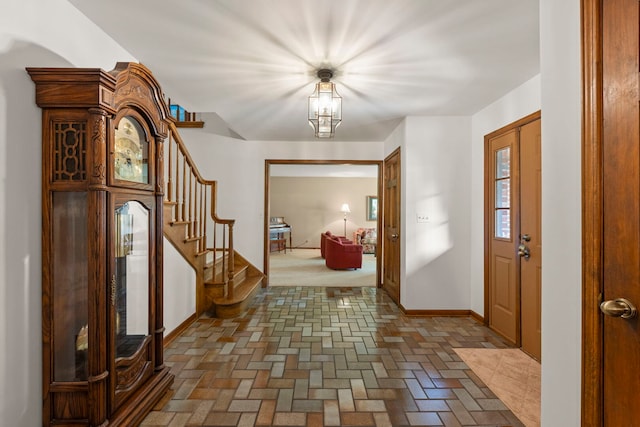 22W281 Mccarron Rd, Glen Ellyn, IL 60137 - foyer entrance with brick patterned floors and stairs