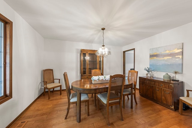 22W281 Mccarron Rd, Glen Ellyn, IL 60137 - dining space with light wood-style floors and a chandelier