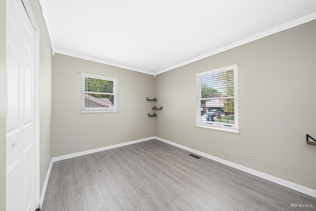 16165 Haven Ave, Orland Hills, IL 60487 - spare room with ornamental molding, wood finished floors, and baseboards