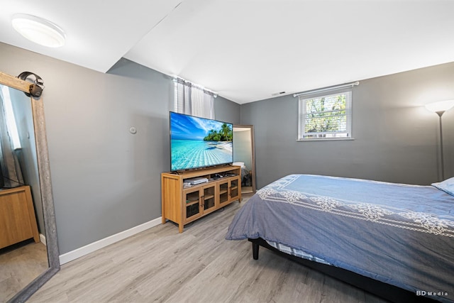 16165 Haven Ave, Orland Hills, IL 60487 - bedroom featuring light wood-type flooring and baseboards
