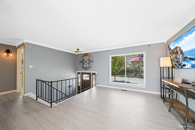 16165 Haven Ave, Orland Hills, IL 60487 - living area with wood finished floors, crown molding, and baseboards