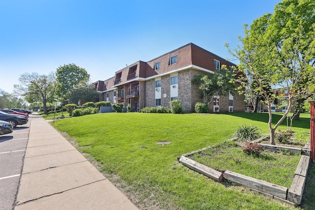 600 Mesa Dr Unit 103, Hoffman Estates, IL 60169 - view of home's community with a lawn