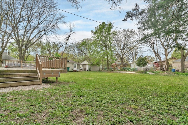 413 Wheeler Ave, Joliet, IL 60436 - view of yard featuring a deck and fence