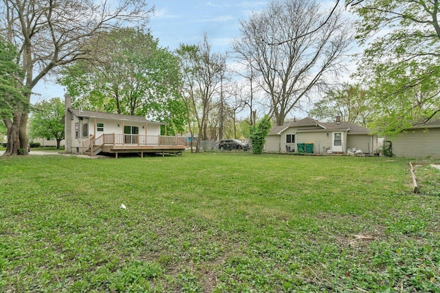 413 Wheeler Ave, Joliet, IL 60436 - view of yard featuring fence and a deck
