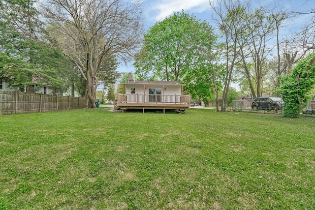 413 Wheeler Ave, Joliet, IL 60436 - view of yard featuring a deck and fence