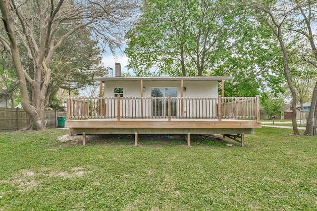 413 Wheeler Ave, Joliet, IL 60436 - rear view of property featuring a yard, fence, a chimney, and a wooden deck