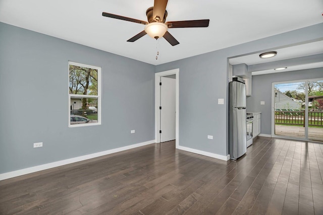 413 Wheeler Ave, Joliet, IL 60436 - interior space with plenty of natural light, baseboards, ceiling fan, and dark wood-style floors