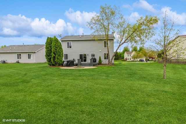 4524 Deames St, Plano, IL 60545 - rear view of property with a patio and a yard