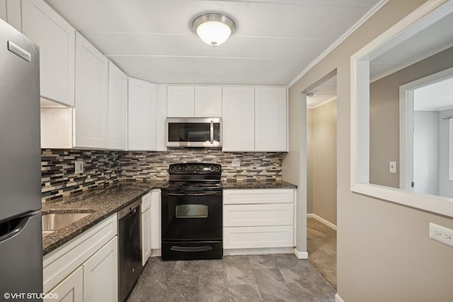 1101 Mercury Dr Unit 1C, Schaumburg, IL 60193 - kitchen with stainless steel appliances, white cabinets, dark stone counters, and backsplash