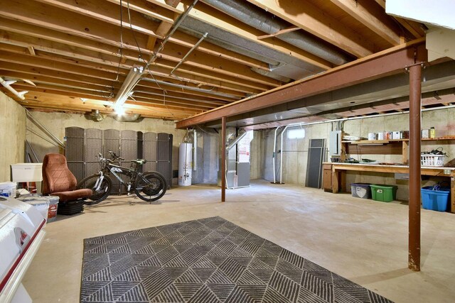 basement with heating unit and gas water heater