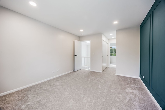 282 Ascot Ln, Streamwood, IL 60107 - unfurnished bedroom featuring light colored carpet, recessed lighting, and baseboards