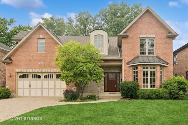 1238 N Illinois Ave, Arlington Heights, IL 60004 - view of front of property with driveway, a front yard, a garage, and brick siding