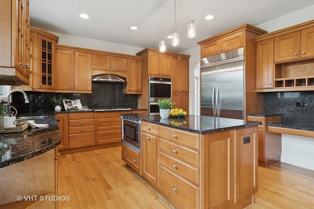 1238 N Illinois Ave, Arlington Heights, IL 60004 - kitchen with built in appliances, a center island, light wood-style floors, decorative backsplash, and recessed lighting