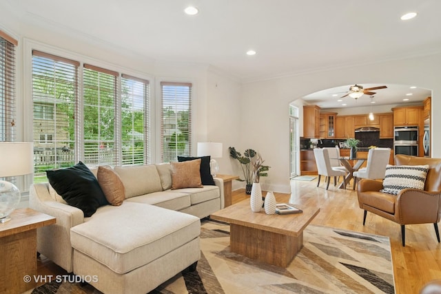 1238 N Illinois Ave, Arlington Heights, IL 60004 - living room with arched walkways, a ceiling fan, ornamental molding, recessed lighting, and light wood finished floors