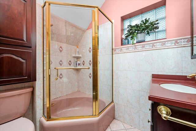 606 N Brainard Ave, La Grange Park, IL 60526 - full bathroom featuring tile walls, toilet, vanity, and combined bath / shower with glass door